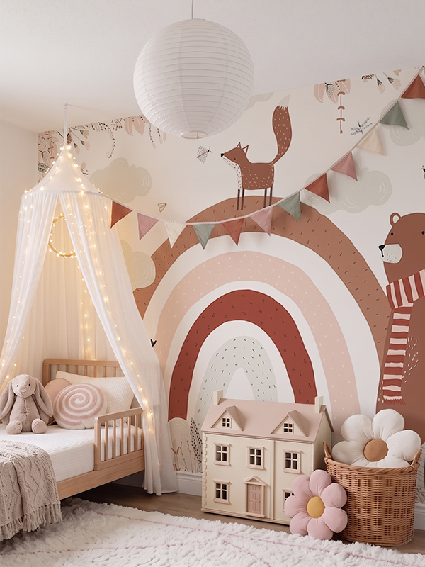 Children's wall mural with oversized rainbow and woodland animals – fox, bear and bunting flags in warm terracotta and blush tones, for girls' nursery or kids' room