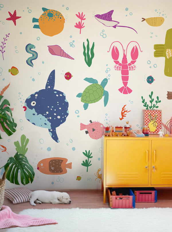 Colorful underwater-themed wallpaper with smiling sea creatures like fish, crabs, and octopuses, designed for children’s rooms.