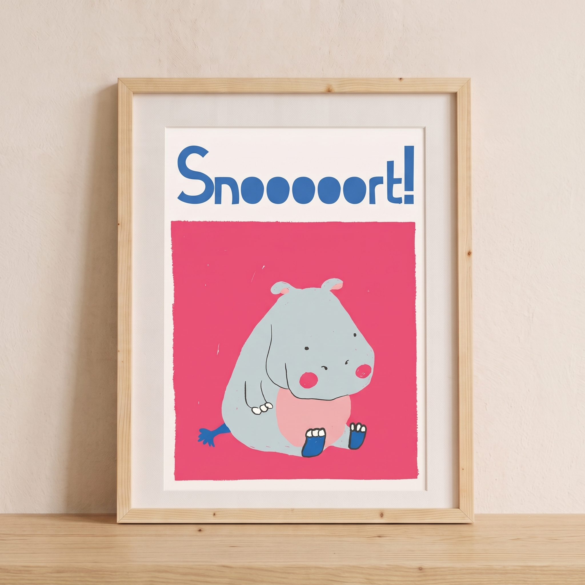 Snoooort the hippo art print in a light wood frame, hanging in a kids room